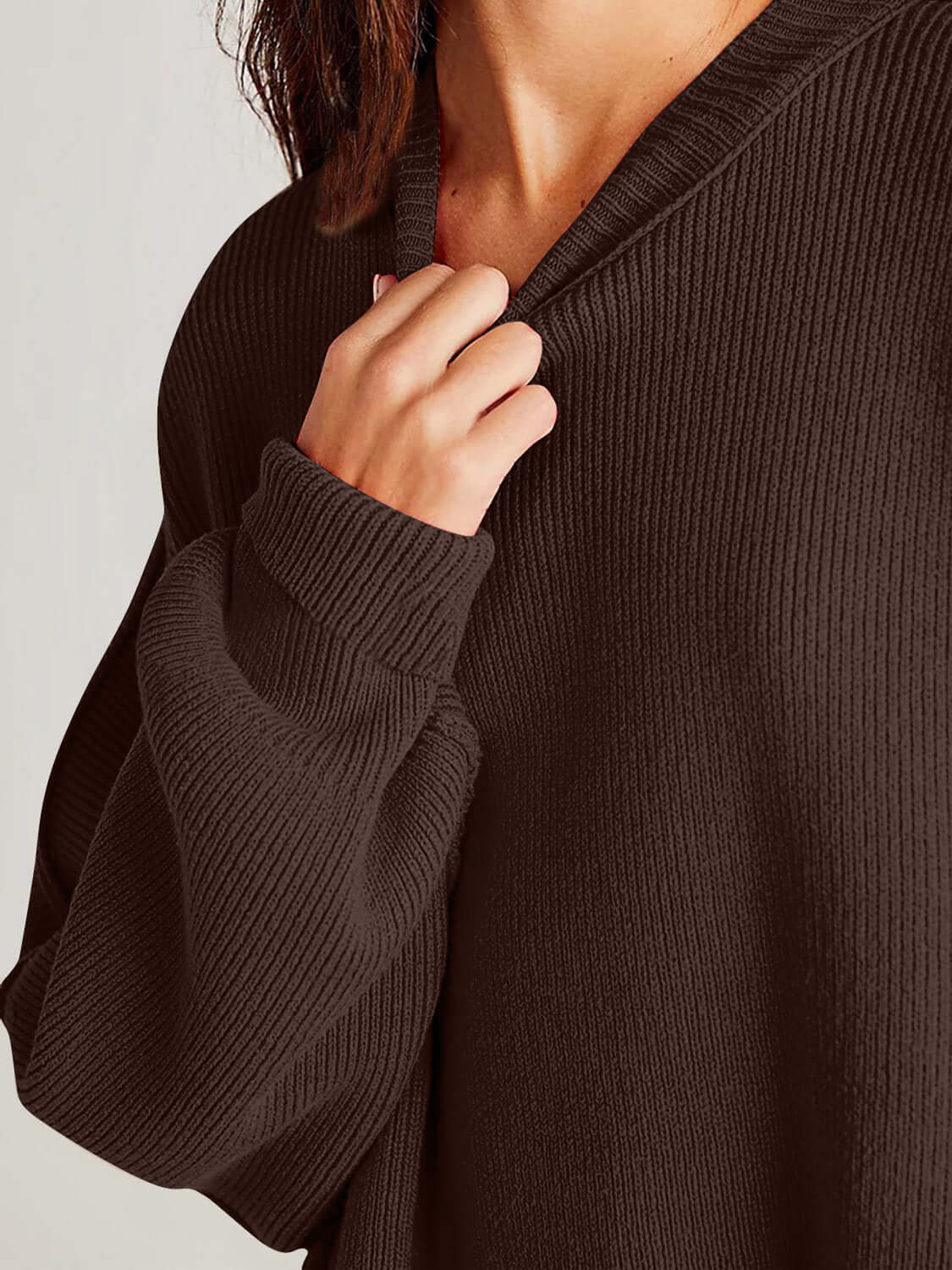 Double Take Side Slit Round Neck Long Sleeve Sweater in dark brown with a cozy knit texture.