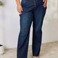 Plus size model wearing high-waisted Judy Blue Button-Fly Straight Jeans, showcasing flattering fit and dark wash denim.