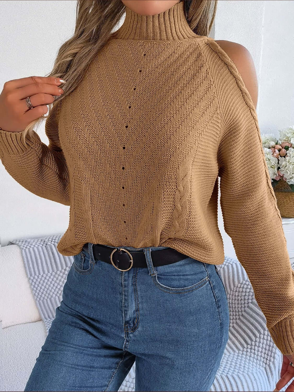 Bella Road Cable-Knit Turtleneck Cold Shoulder Sweater in tan, featuring a stylish cut-out design. Cozy and chic for chilly days.