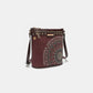 Nicole Lee USA crossbody bag with metallic stitching, embroidery, and inlaid rhinestones, featuring front and back zip pockets.