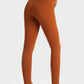 Back view of Millennia Ultra Soft High Waist Leggings in rust color, showcasing the snug fit and high waistband.