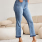 Woman wearing release hem cropped bootcut Judy Blue Jeans with high heels, showcasing trendy and versatile denim style in a modern setting