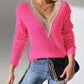 Bright pink openwork V-neck long sleeve sweater with stylish design for a chic fashion statement.