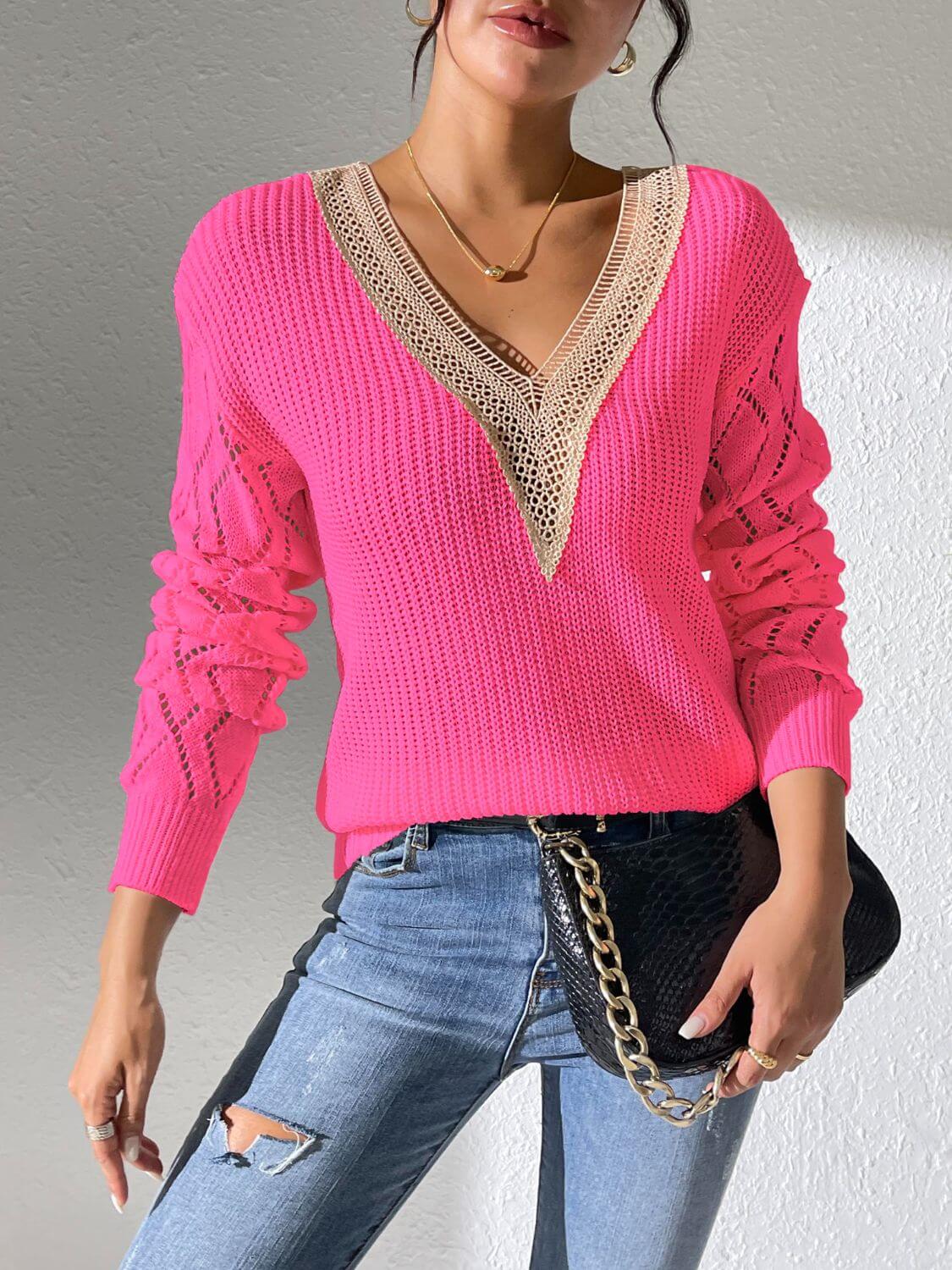 Bright pink openwork V-neck long sleeve sweater with stylish design for a chic fashion statement.