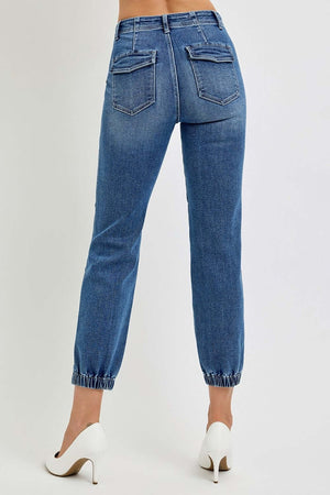 High rise ankle jogger jeans with elastic cuffs shown from the back, showcasing soft stretchy denim and sleek silhouette.