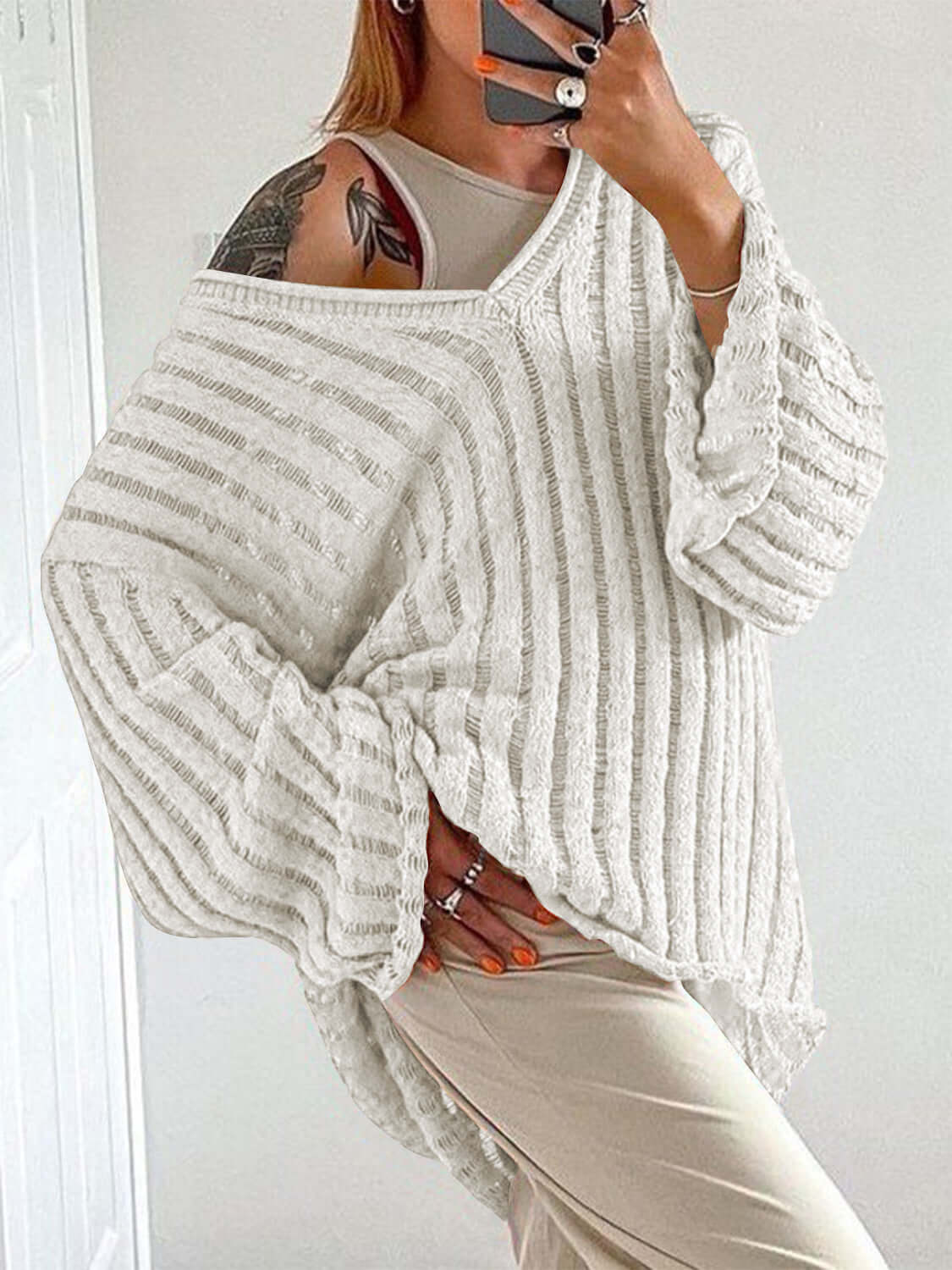 Stylish Bella Road V-Neck Long Sleeve Sweater in white, perfect for cozy fall fashion.