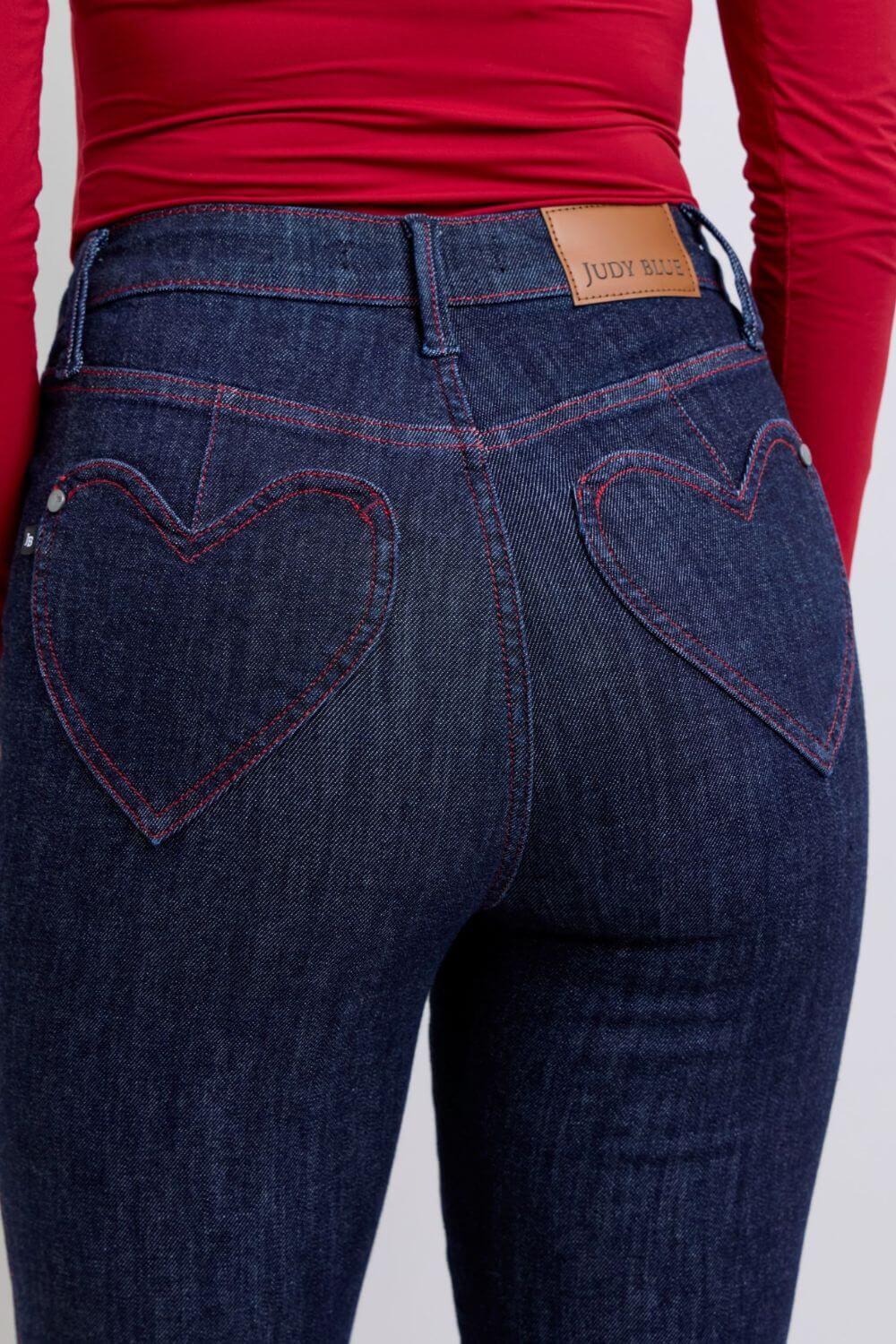 Judy Blue skinny jeans with heart-shaped back pockets, high-rise design, perfect for casual or night out styles.