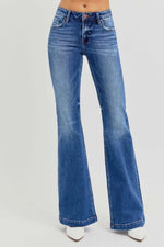 Risen full size low rise flare jeans with pockets, vintage-inspired, slightly stretchy denim for a trendy and casual look.