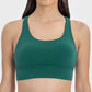 Stylish green active tank top with a scoop neck design, perfect for workouts and active lifestyles.