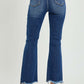 High Rise Distressed Crop Flare Jeans by Risen Jeans – Back View of Chic and Edgy Denim with Flared Hem and Heels