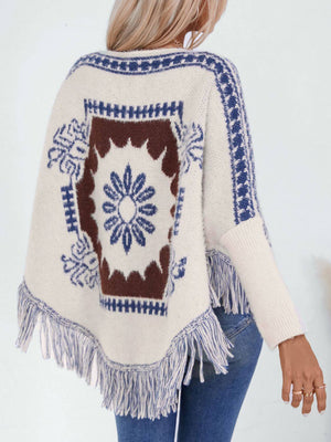 Stylish Bella Road Fringe Geometric Long Sleeve Poncho with cream and blue pattern, perfect for boho chic outfits.