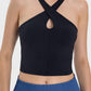 Millennia Crisscross Grecian Neck Active Cami in black, showcasing a stylish cut and unique neckline perfect for workouts.