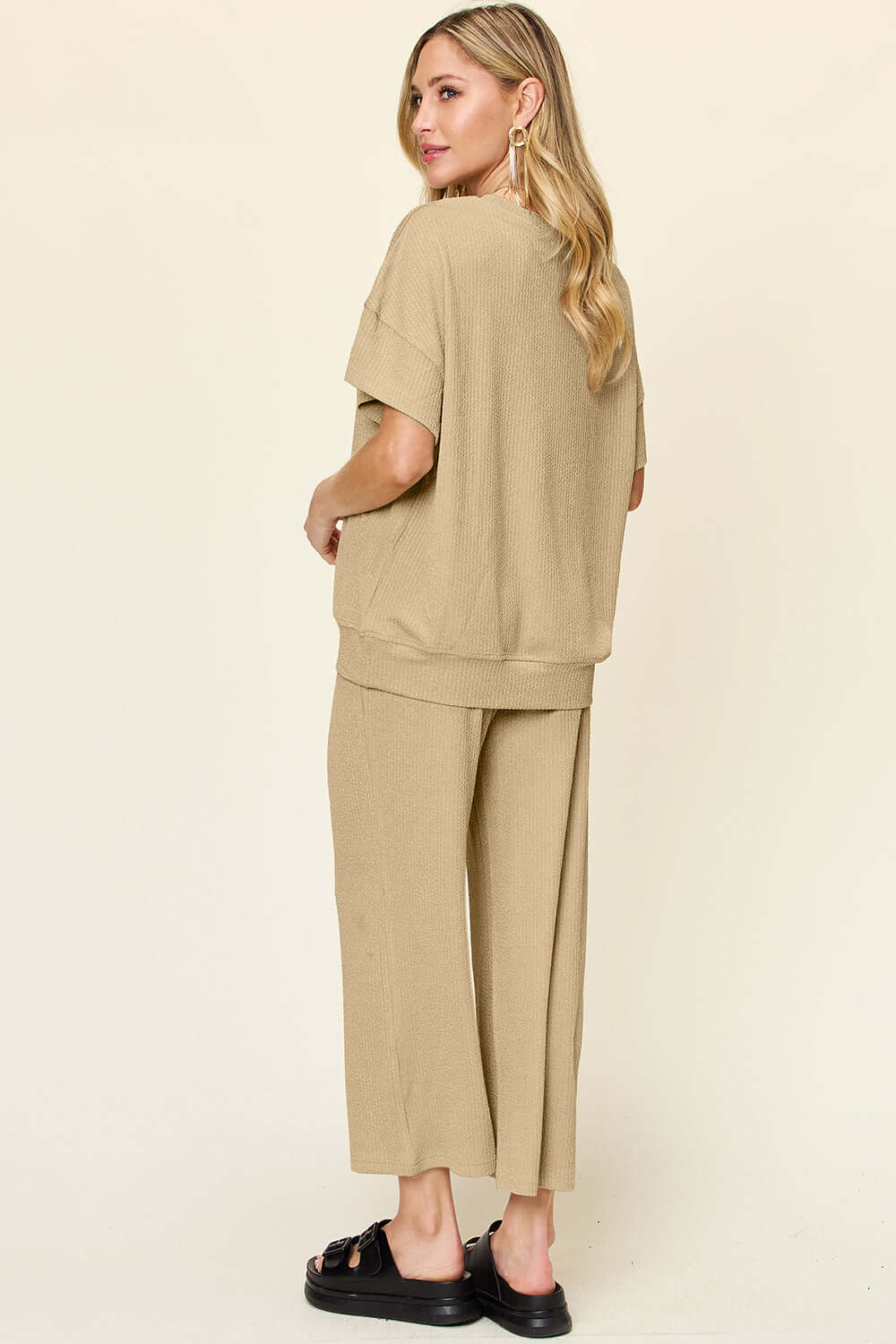 DOUBLE TAKE Full Size Texture Round Neck Short Sleeve T-Shirt and Wide Leg Pants at Bella Road