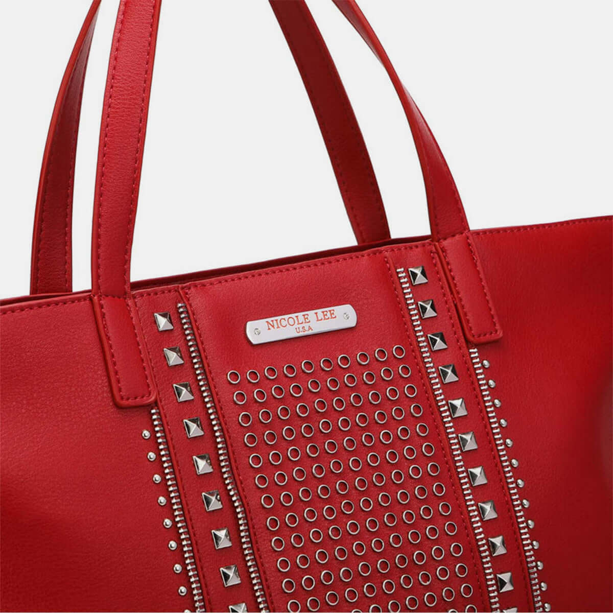 Nicole Lee USA red studded large tote bag made from vegan leather with dual top handles and stud detailing.