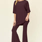 DOUBLE TAKE Full Size Round Neck Drop Shoulder T-Shirt and Flare Pants Set at Bella Road