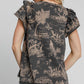 Stylish back view of the Umgee ruffled landscape print short sleeve top in French terry, featuring whimsical print details.