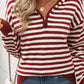 Woman wears Perfee Striped Long Sleeve Hooded Sweater in burgundy, adds chic twist to casual look with striped pattern and comfy hood.