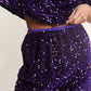 Purple J.NNA Sequin Back Slit Midi Skirt showcasing dazzling sequin details, perfect for glamorous outings and special events.