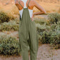 DOUBLE TAKE Full Size V-Neck Sleeveless Jumpsuit with Pockets at Bella Road