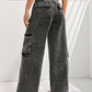 Woman wearing Bella Road Wide Leg Jeans with Pockets featuring a relaxed fit and multiple back pockets.