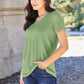 Woman wearing green Basic Bae Bamboo V-Neck Short Sleeve T-Shirt outdoors