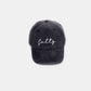 SALTY Embroidered Vintage Washed Baseball Cap in a classic black color with a worn-in look and playful embroidery.