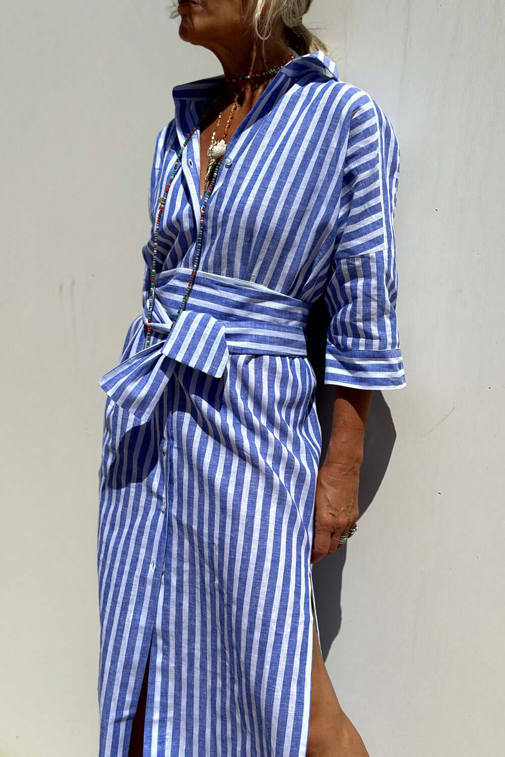 Bella Road Tied Button Up Three-Quarter Sleeve Dress in blue and white stripes. Casual yet chic outfit perfect for any occasion.