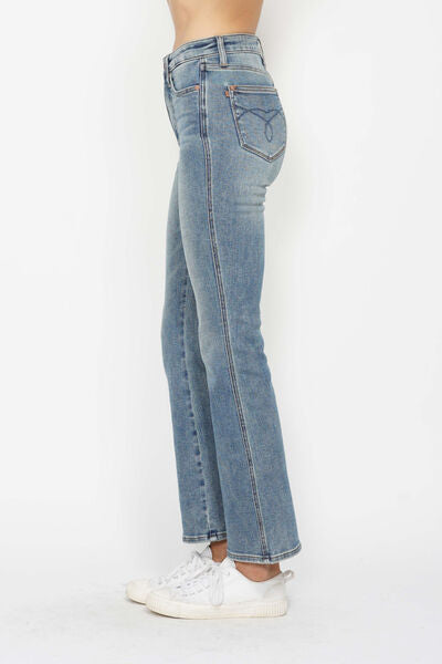 Side view of Judy Blue tummy control bootcut jeans showcasing embroidered pockets and stylish design.