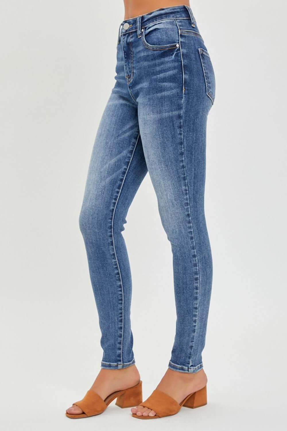 Mid Rise Ankle Skinny Jeans by Risen Jeans showcasing a sleek and stylish silhouette with a trendy ankle length and comfortable fit.