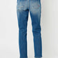 Back view of Judy Blue Distressed Slim Jeans showcasing stylish distressed details and flattering slim fit, ideal for casual and trendy outfits.