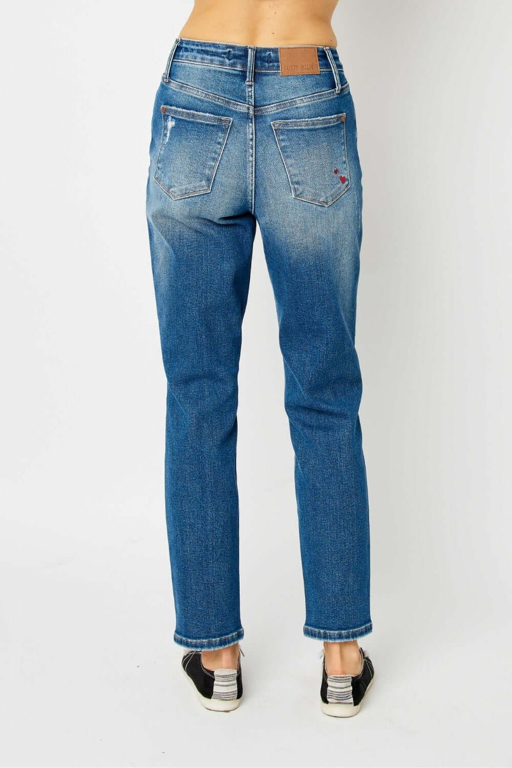 Back view of Judy Blue Distressed Slim Jeans showcasing stylish distressed details and flattering slim fit, ideal for casual and trendy outfits.