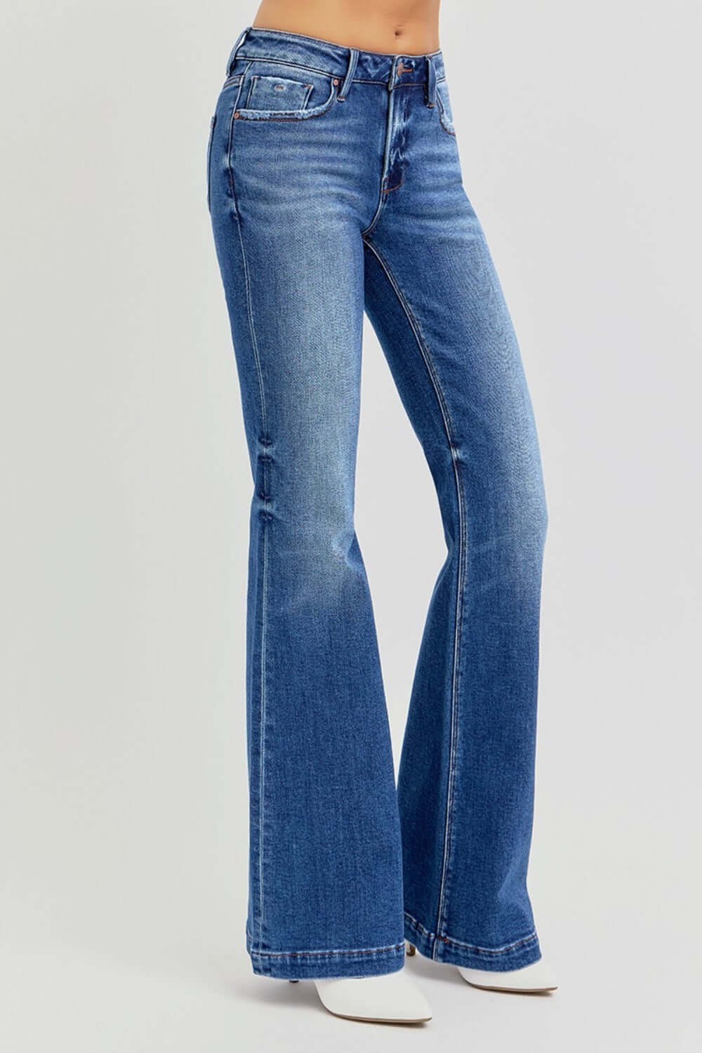 Risen full-size low rise flare jeans with pockets, flattering vintage-inspired silhouette, perfect with blouses or tees for a trendy look.