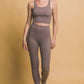 Model showcasing Love Tree high waist leggings and crop top, perfect for workouts and casual outings.