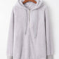 Gray teddy hoodie with quarter-zip and drawstring, perfect for cozy and stylish fashion.