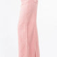 Trendy pink high waist distressed wide leg jeans with a relaxed fit, perfect for chic styling.