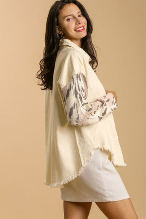 Umgee plus size distressed button-up jacket with raw hem and animal print sleeves, perfect for stylish layering.