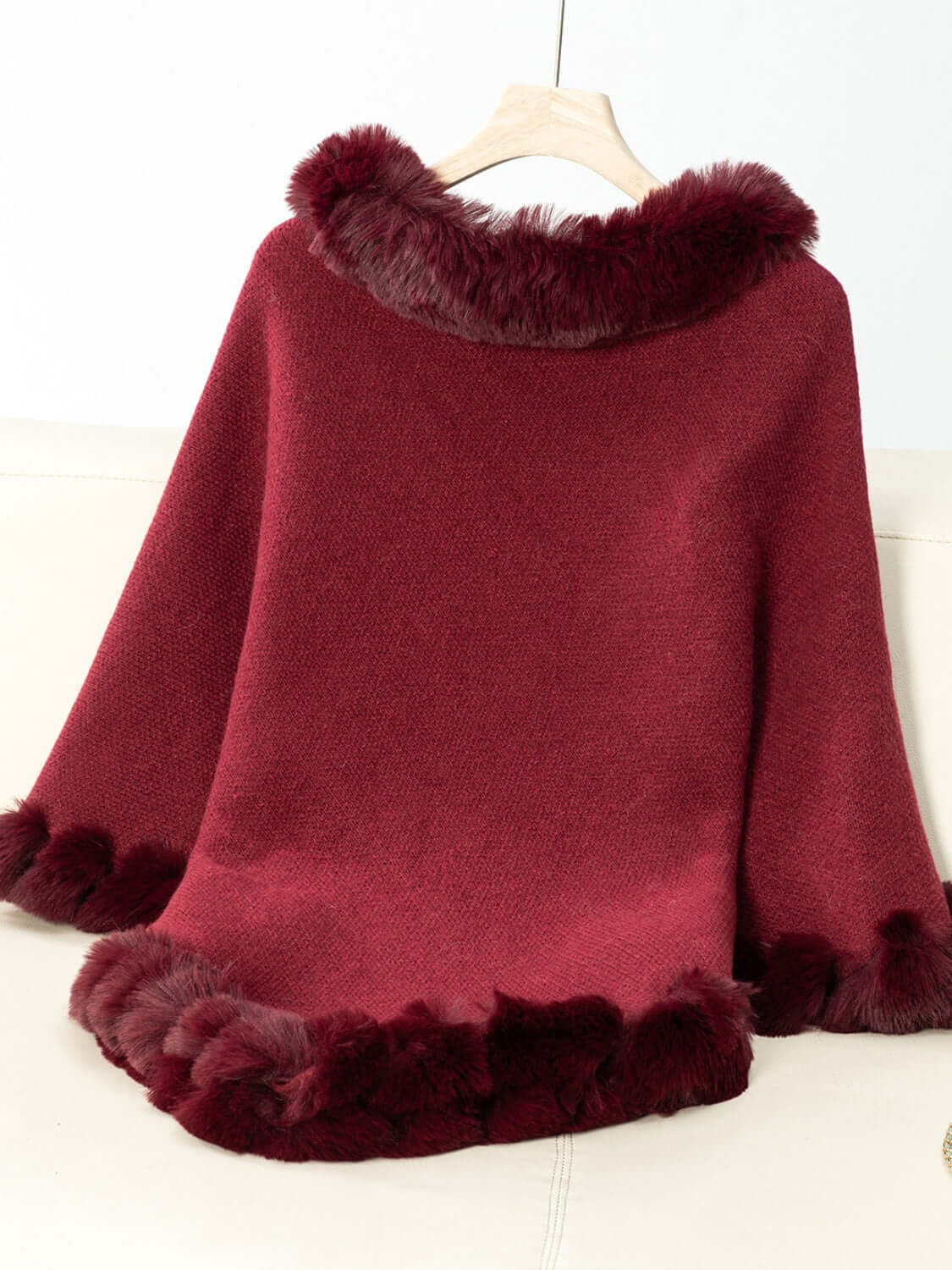 Cozy Bella Road Fuzzy Trim Poncho in deep burgundy, featuring stylish three-quarter sleeves and warm fuzzy trim.