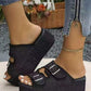 Bella Road Raw Hem Wedge Buckle Sandals in black worn with denim jeans, showcasing stylish design and mid heel comfort.