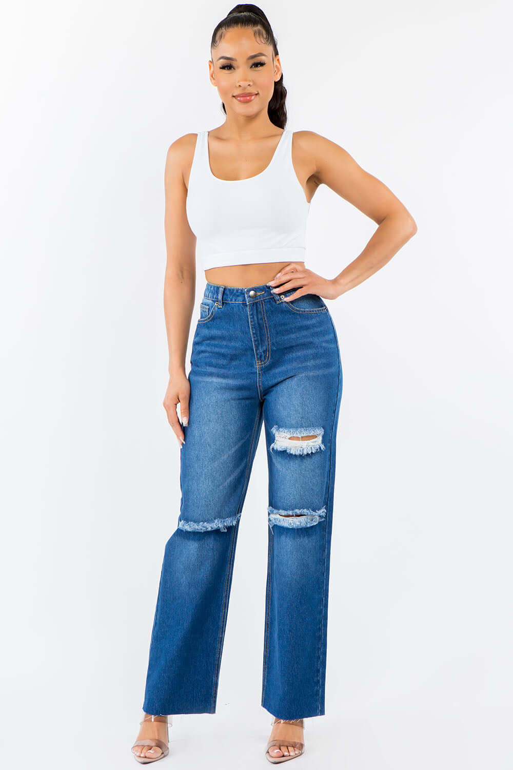 High Waist Distressed Wide Leg Jeans with ripped knees and button waist, non-stretch denim, worn by model in white crop top.