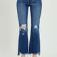 High Rise Distressed Crop Flare Jeans by Risen Jeans showcasing trendy detailing and modern flair.