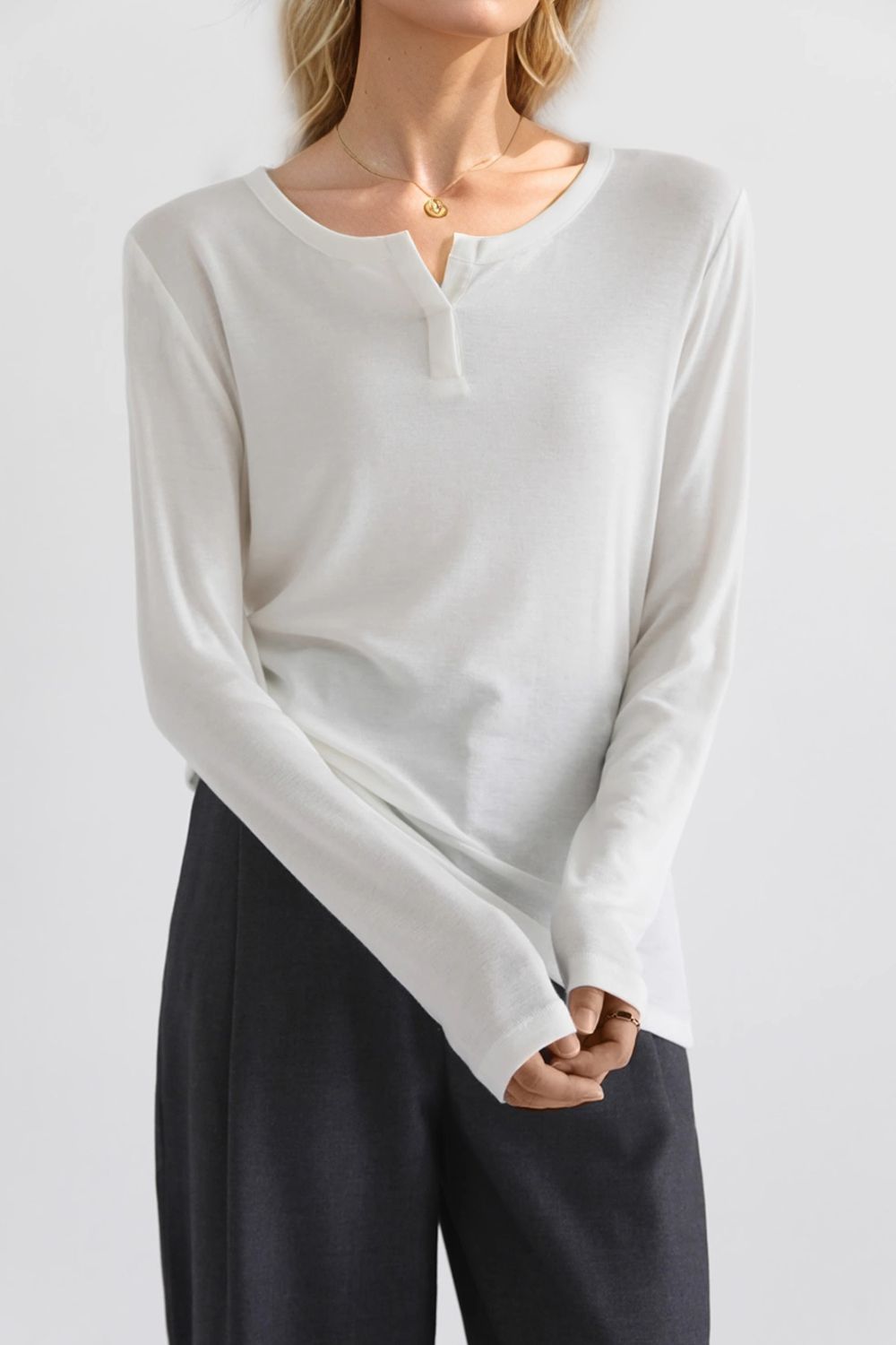 Basic Bae Notched Long Sleeve T-Shirt in white, featuring a unique neckline, perfect for casual or dressy occasions.