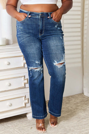 Petite mid-rise hand sand destroy bootcut jeans by Judy Blue Jeans featuring distressed detailing, slightly stretchy fabric, and a flattering fit.