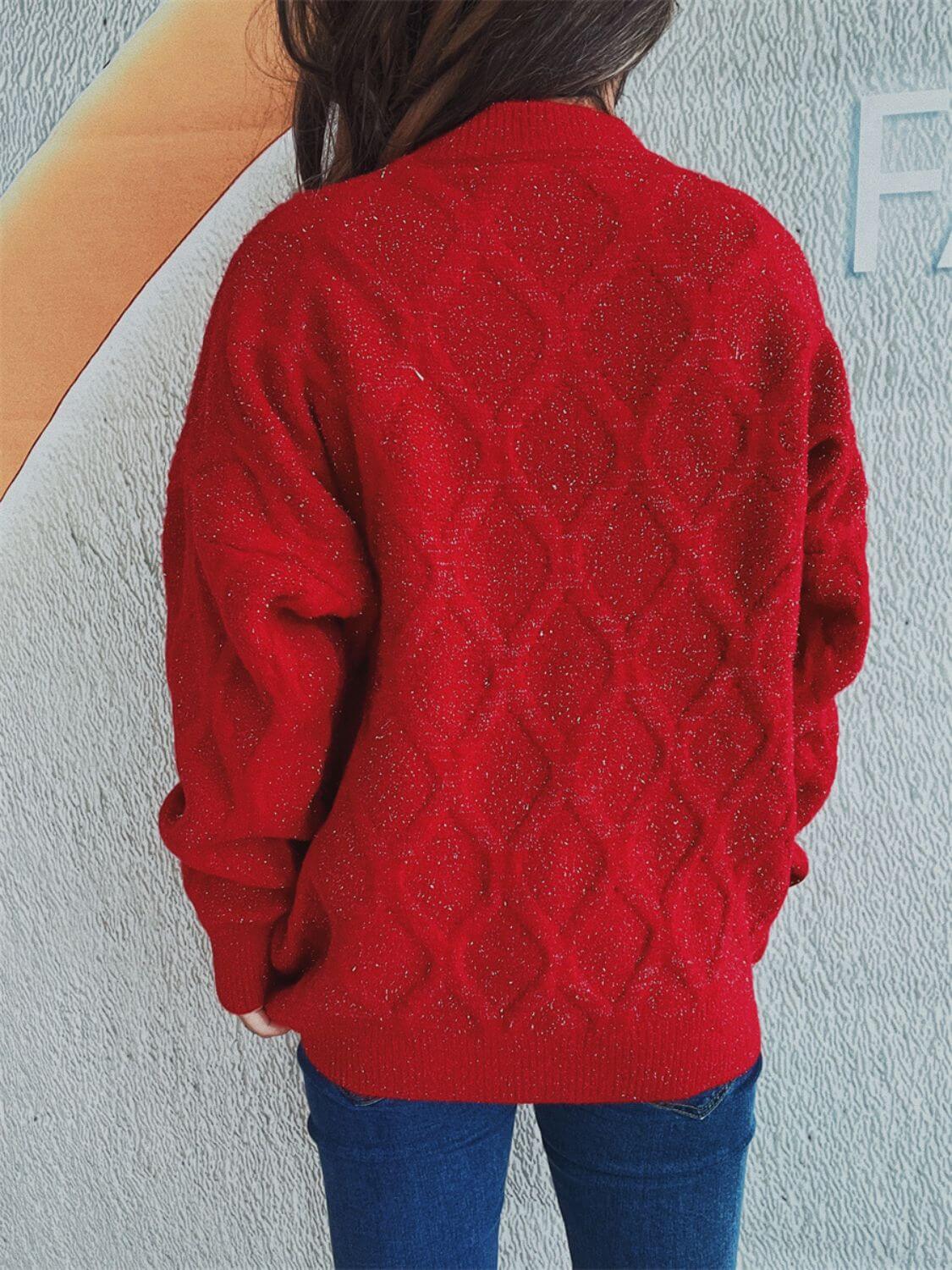 Woman wearing Bella Road Diamond Round Neck Long Sleeve Sweater in red, showing intricate diamond pattern on the back.