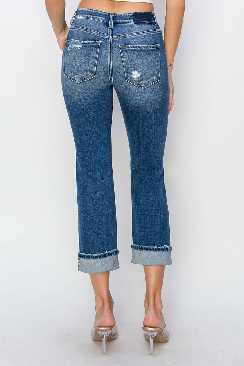 Risen full size cuffed ankle distressed straight jeans, back view showcasing trendy style and rugged charm.