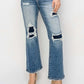 High Rise Distressed Ankle Flare Jeans by Risen Jeans with trendy distressed details and a stylish flare cut, perfect for a chic look