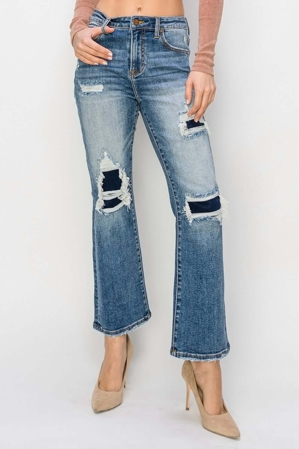 High Rise Distressed Ankle Flare Jeans by Risen Jeans with trendy distressed details and a stylish flare cut, perfect for a chic look