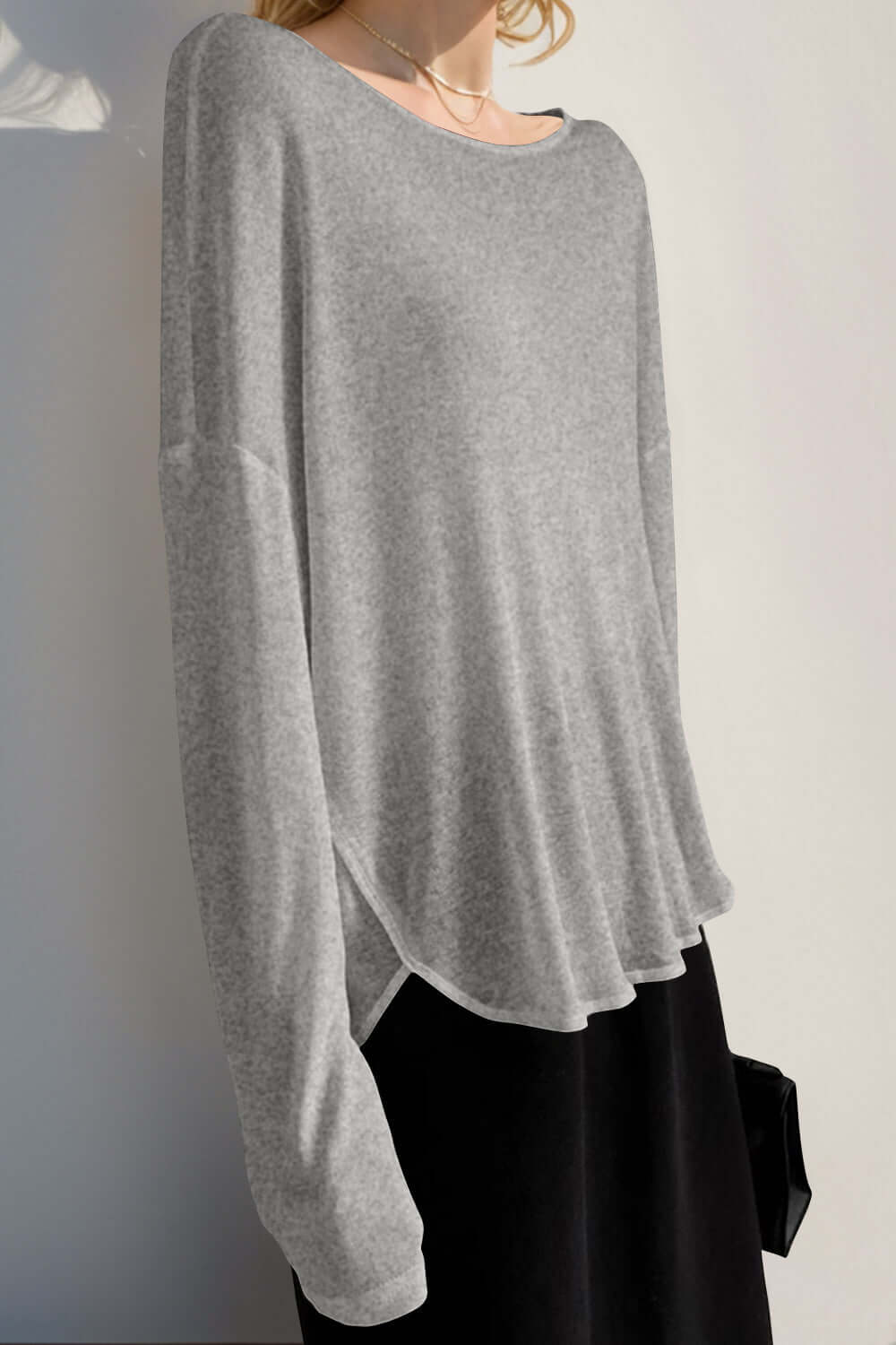 Basic Bae High-Low Long Sleeve T-Shirt in gray, featuring a relaxed fit with sheer hem, perfect for casual monochrome fashion.