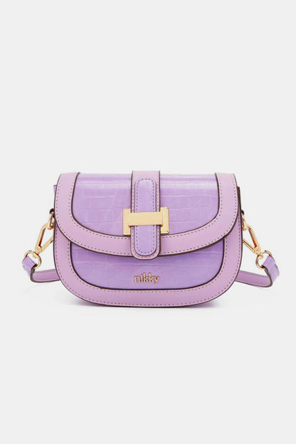 Nicole Lee USA Croc Embossed Crossbody Bag in purple with adjustable strap and gold buckle, featuring a sophisticated and luxury design.