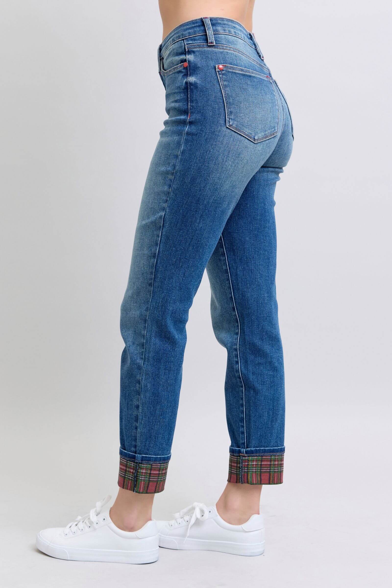 Judy Blue plaid print cuff straight leg jeans with pockets, styled with white sneakers, showcasing a trendy look.