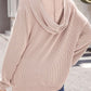 Textured Kangaroo Pocket Long Sleeve Hoodie in beige with hood, shown from the back, worn by a model with blue jeans.